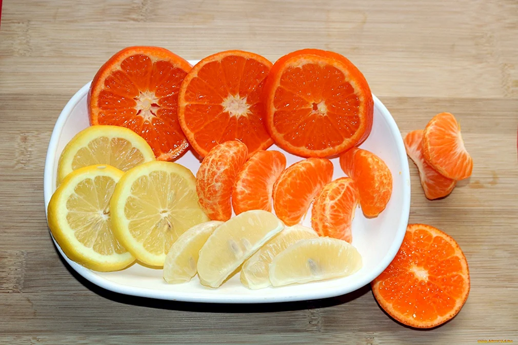 Помело лимон апельсин мандарин грейпфрут